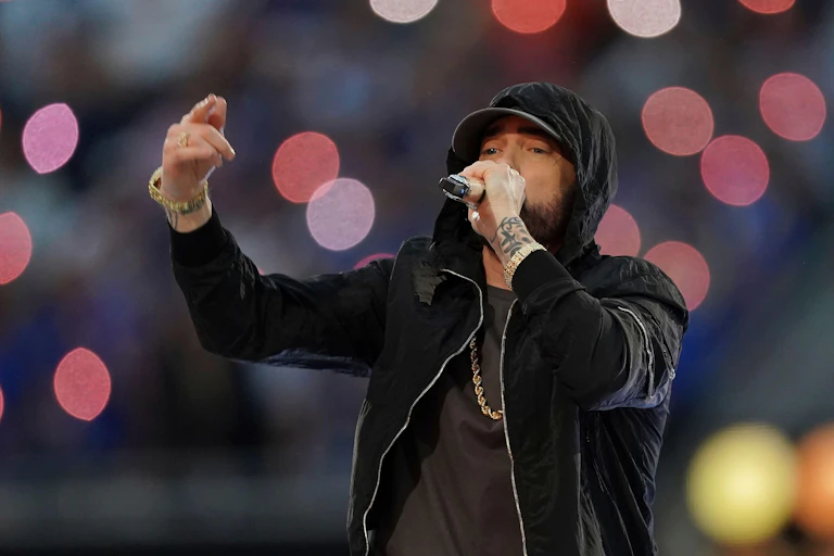Eminem performing on stage.