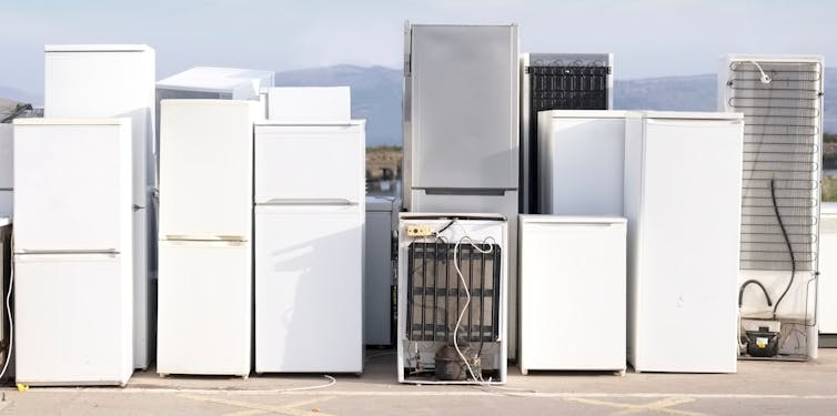 A collection of used refrigerators.