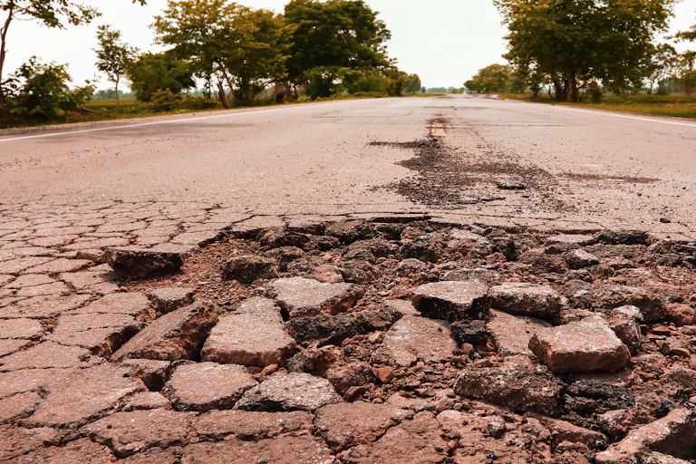 Cracking asphalting on highway.