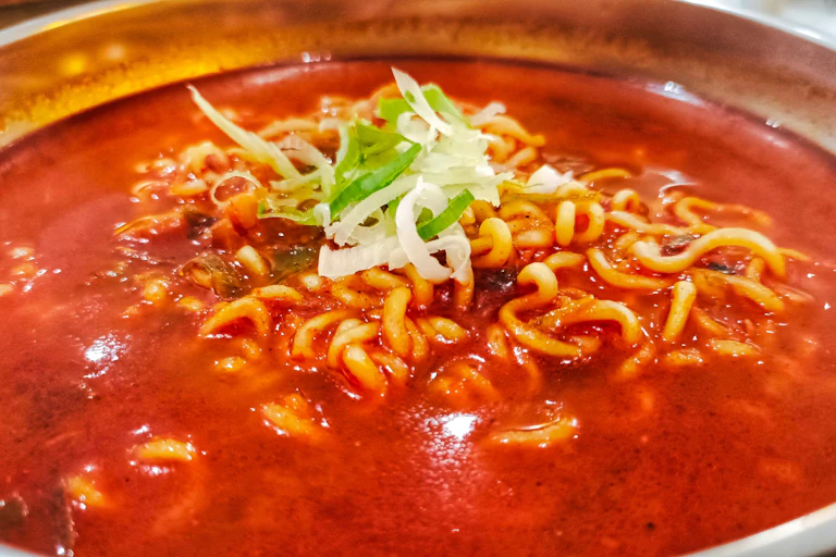 Close-up of a red coloured spicy ramen noodle from Korea.