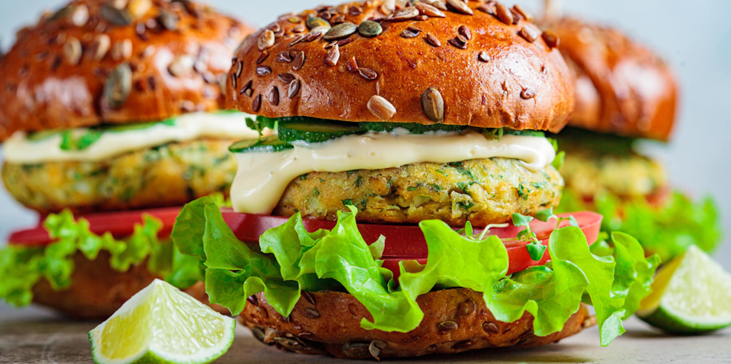 Veggie burgers with quarters of lime