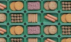 Plant-based foods such as burgers and sausages in trays