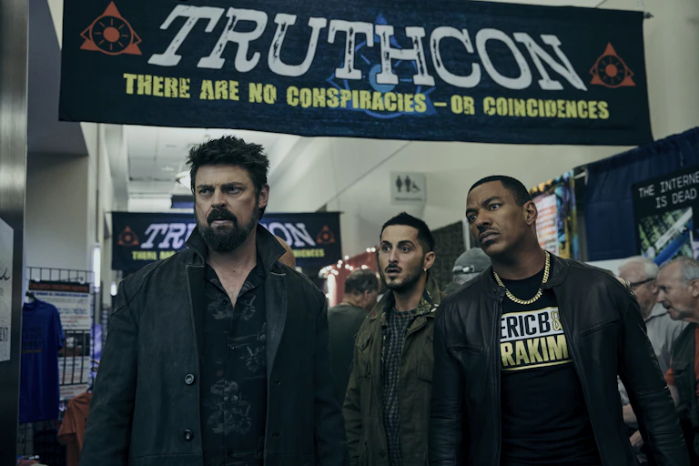 Members of The Boys at a conspiracy convention.