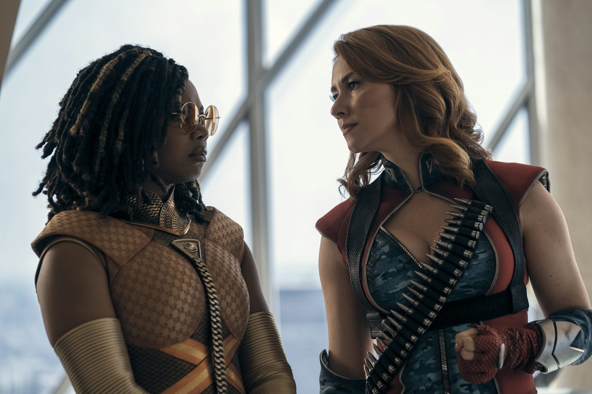 Two superheroes talking