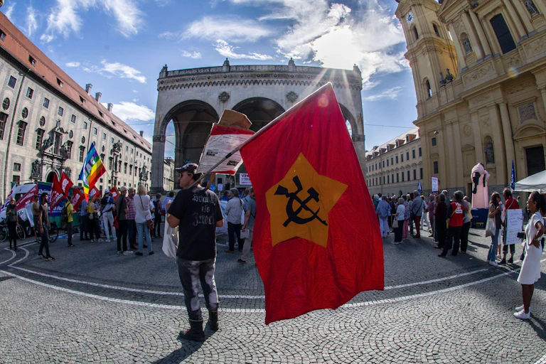 A pro-Russia supporter with a Soviet flag, demonstrates in Germany.