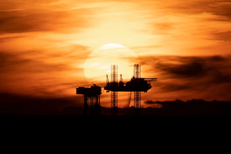 offshore oil rig at sunset