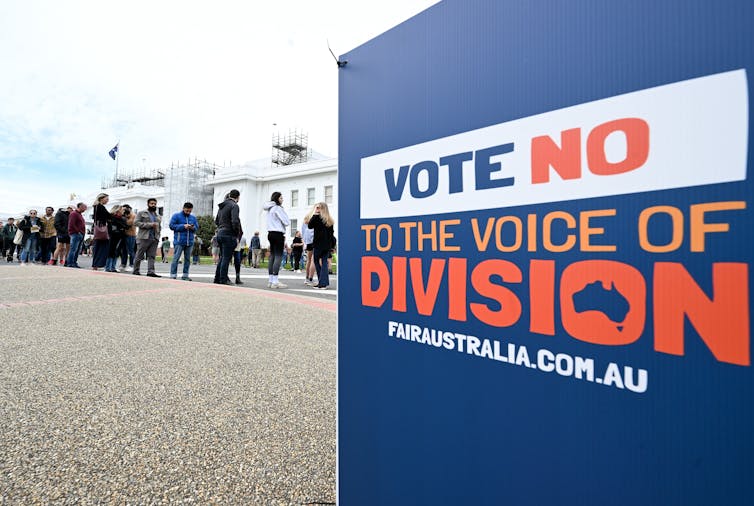 A campaign sign that says vote no to the voice of division.
