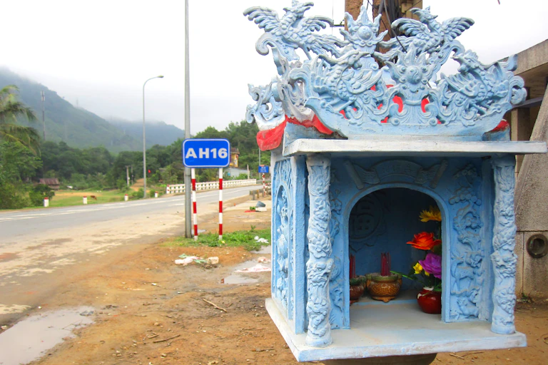 A blue spirit house.