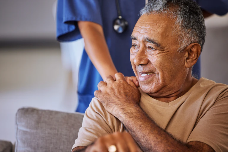 Medic placing hand on patient's shoulder