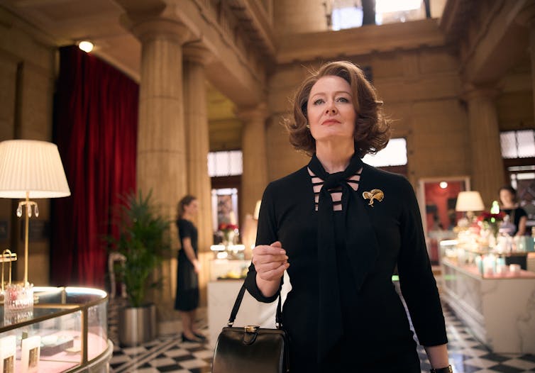 Production image: Miranda Otto in a department store.