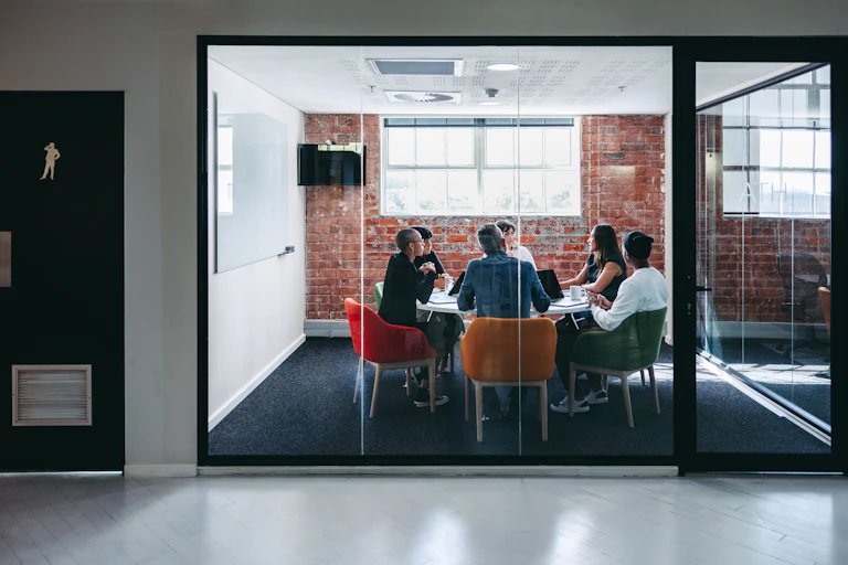 Group of businesspeople meeting in a boardroom