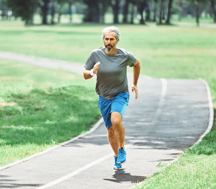 An older man running.