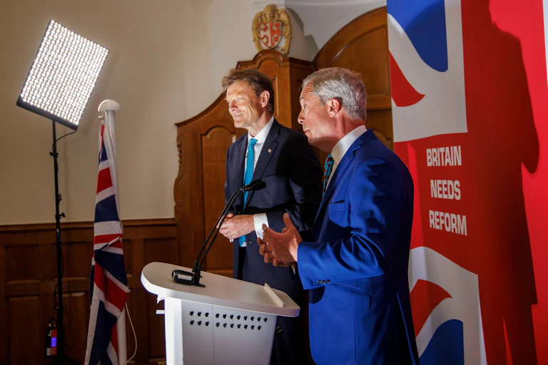 Richard Tice and Nigel Farage on a stage