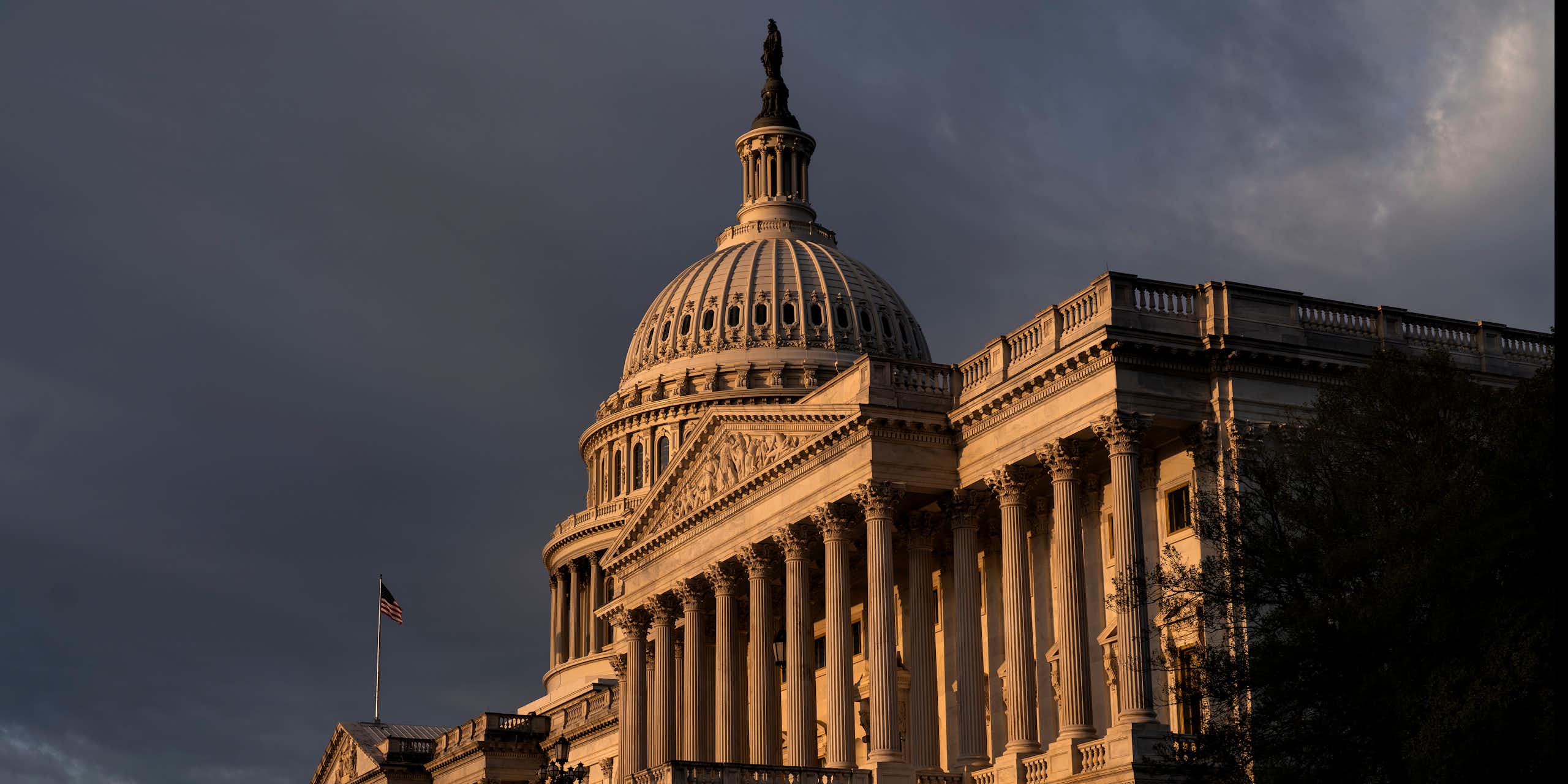 The U.S. Capitol, shown against dark clouds. 