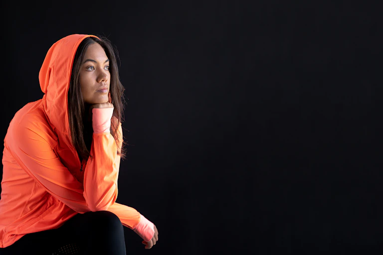A young woman looking pensive