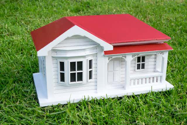Bungalow villa house model in Australian or New Zealand NZ victorian style on lawn grass