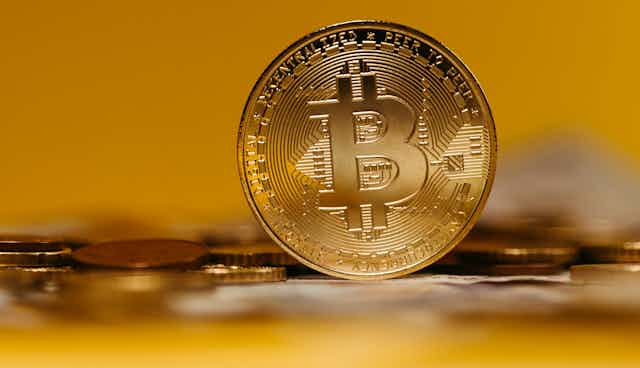 Bitcoin on yellow background