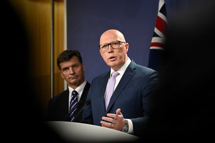 peter dutton, man at podium