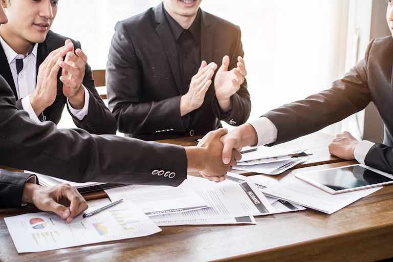 https://www.gettyimages.com/detail/photo/group-asia-businessman-together-create-a-mutually-royalty-free-image/902558326