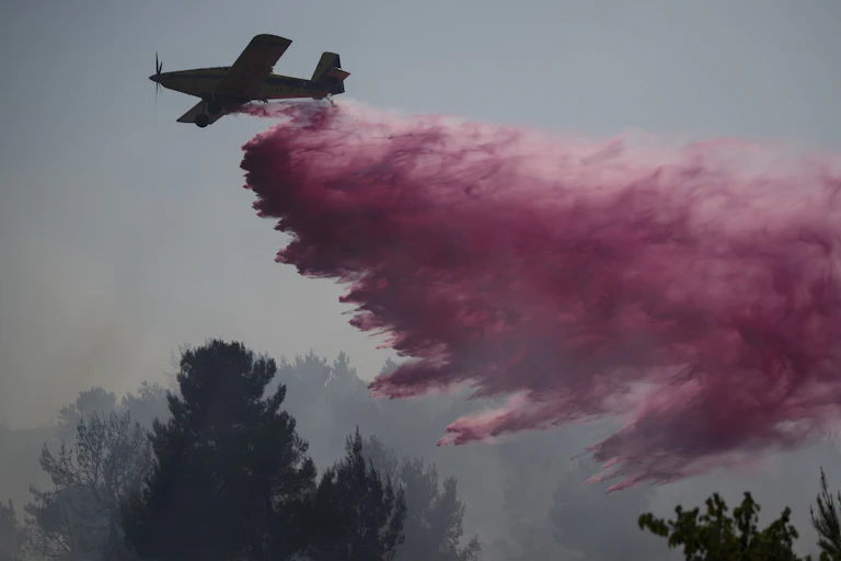 Airplane uses fire retardant.