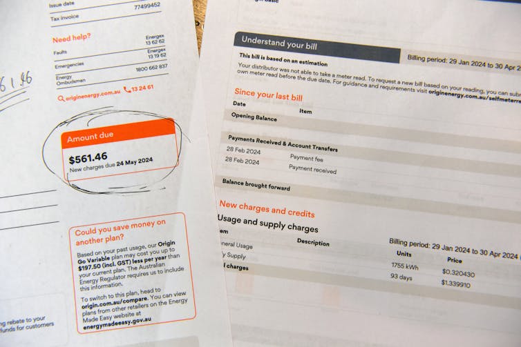 An electricity bill sits on a table.