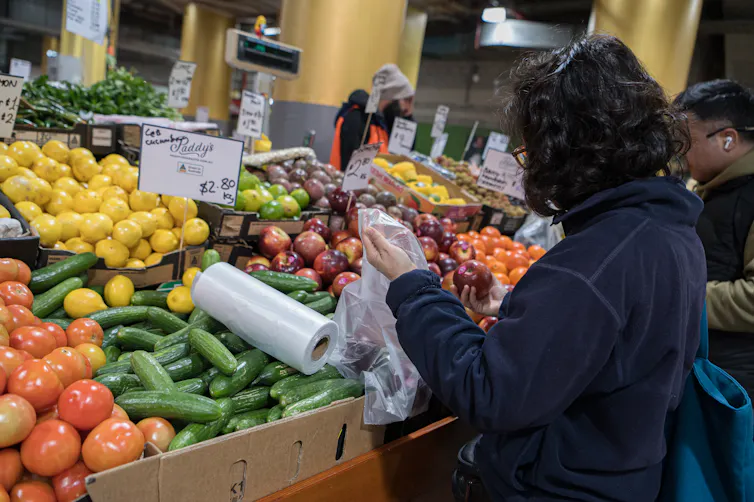 woman shopping for fruit and vegetables