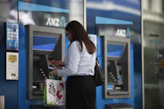 Woman at ATM