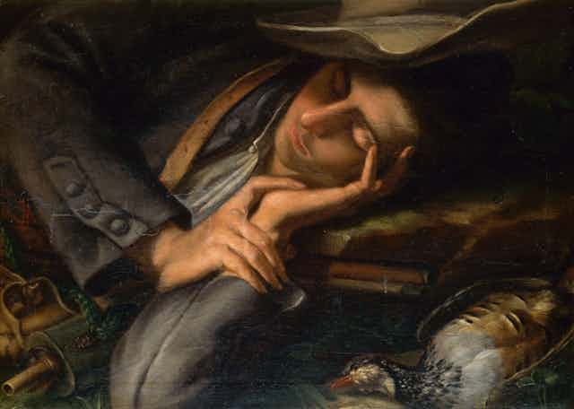 An old painting depicting a man asleep