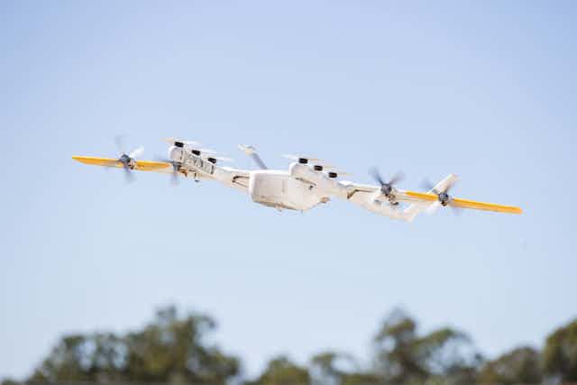 Photo of a small drone aircraft in flight.