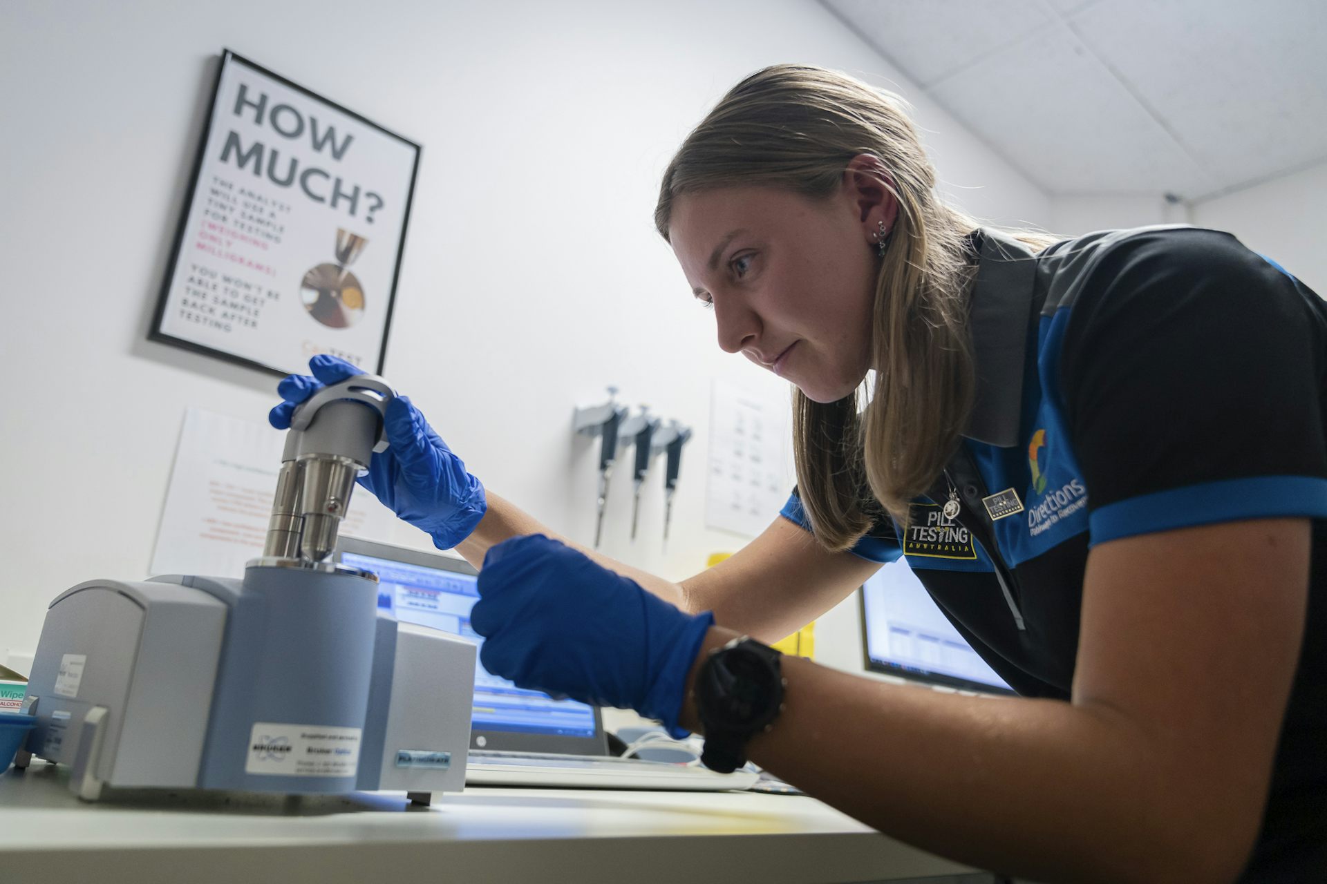 A staff member at CanTEST performing drug checking.