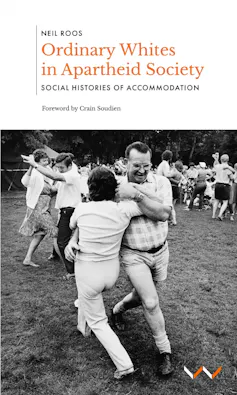 A book cover with a photo of a middle-aged couple in the foreground dancing a traditional Afrikaner dance, other couples in the background on an open field.