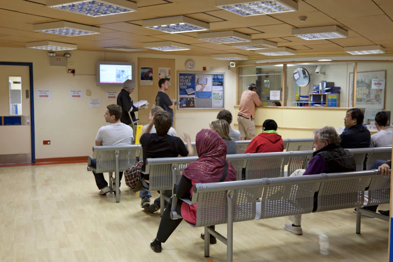 People in the waiting room at the Royal Free Hospital in London