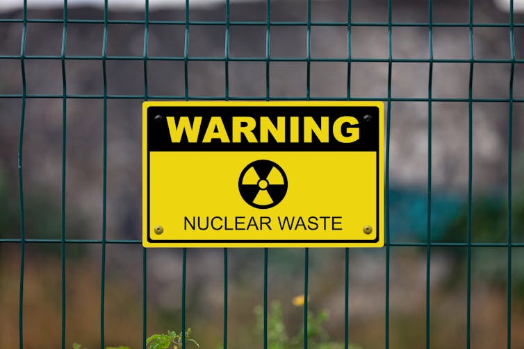sign which says 'warning: nuclear waste'