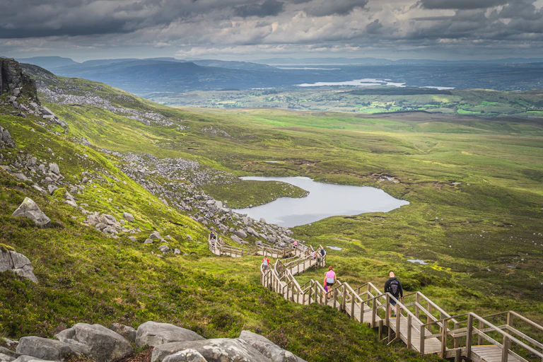 Hikers on the Cuilcagh (Stairway to Heaven) hiking trail in County Fermanagh.