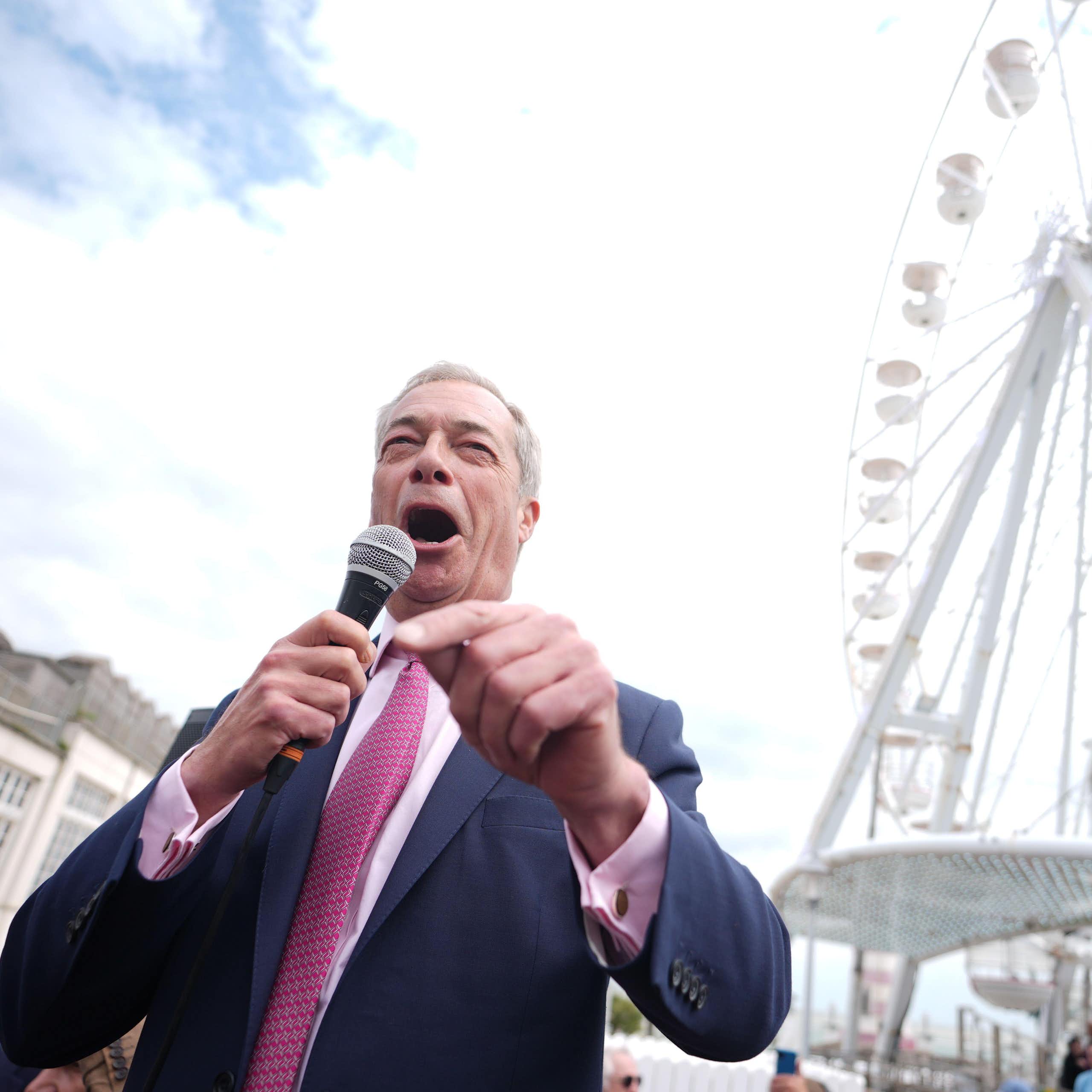 Nigel Farage in front of a ferris wheel in Clacton.