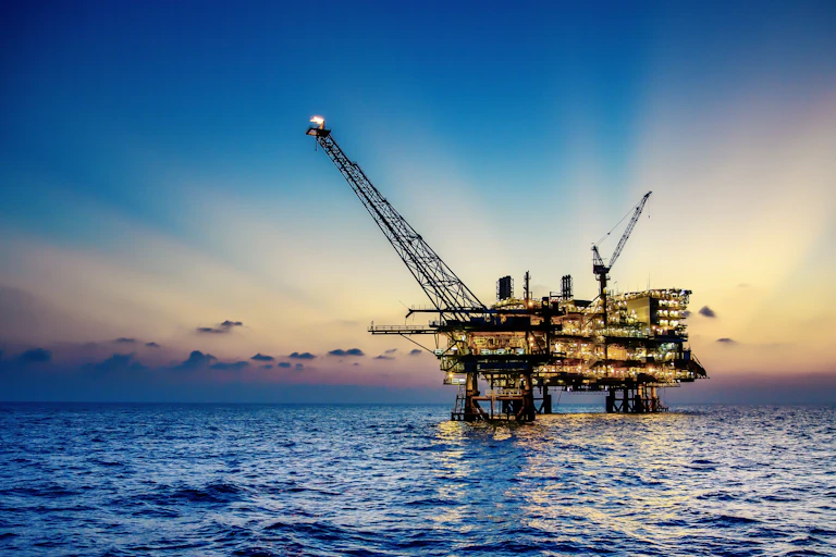 oil platform at sunset