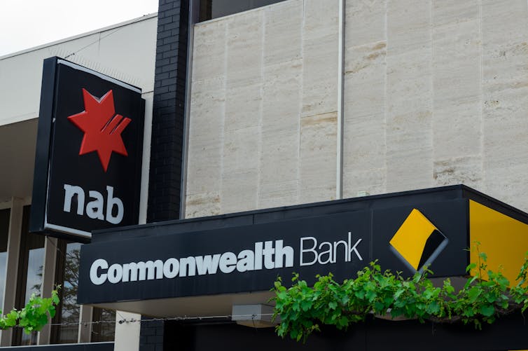 NAB and Commonwealth Bank signs on their bank buildings