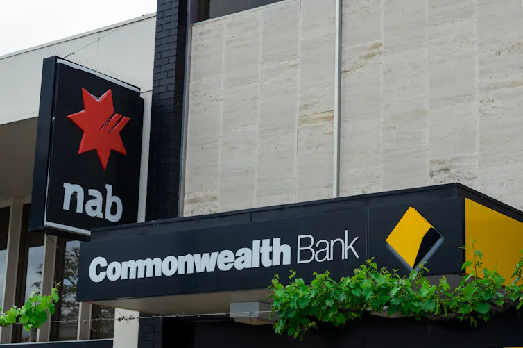 NAB and Commonwealth Bank signs on their bank buildings