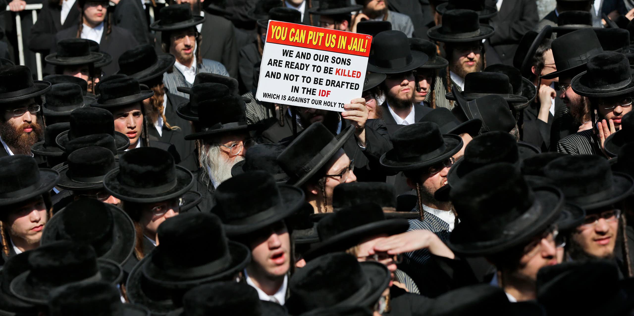 Ultra-Orthodox Haredi Jews march against being conscripted into the IDF, 