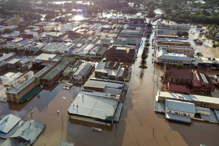 Aerial showing Lismore in flood at sunset