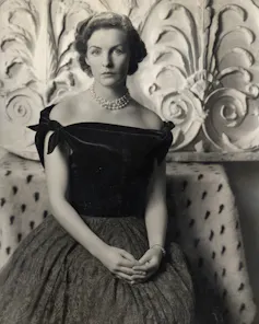 A young aristocratic woman in evening dress.
