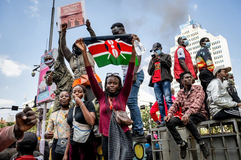 Protester holds a Kenyan flag during the nationwide demonstration.