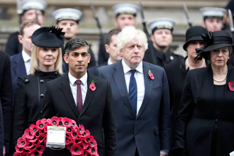 Liz Truss, Rishi Sunak, Boris Johnson and Theresa May at a remembrance day ceremony.