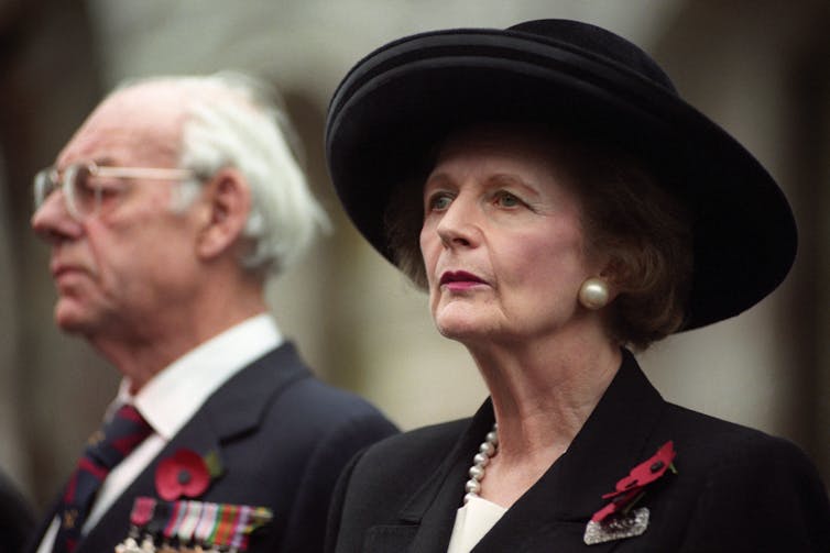 Margaret Thatcher dressed in black.