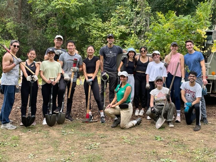 A group of tree planters with spades