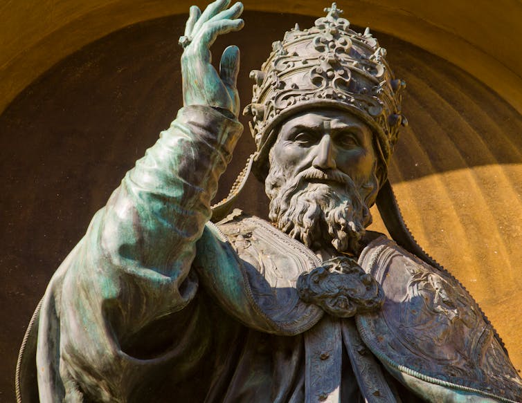 An old sculpture of Pope Gregory XIII in Bologna Italy