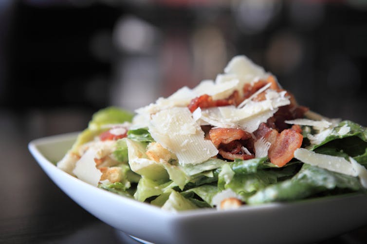 A salad with bacon