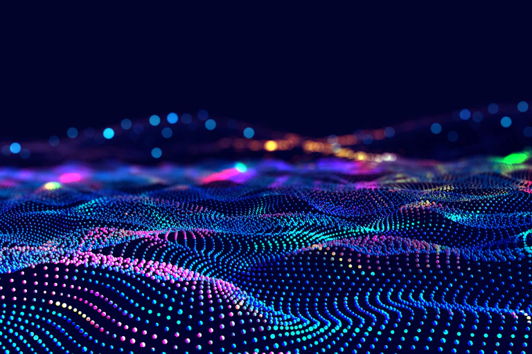 Abstract image of waves of coloured dots against a black background.