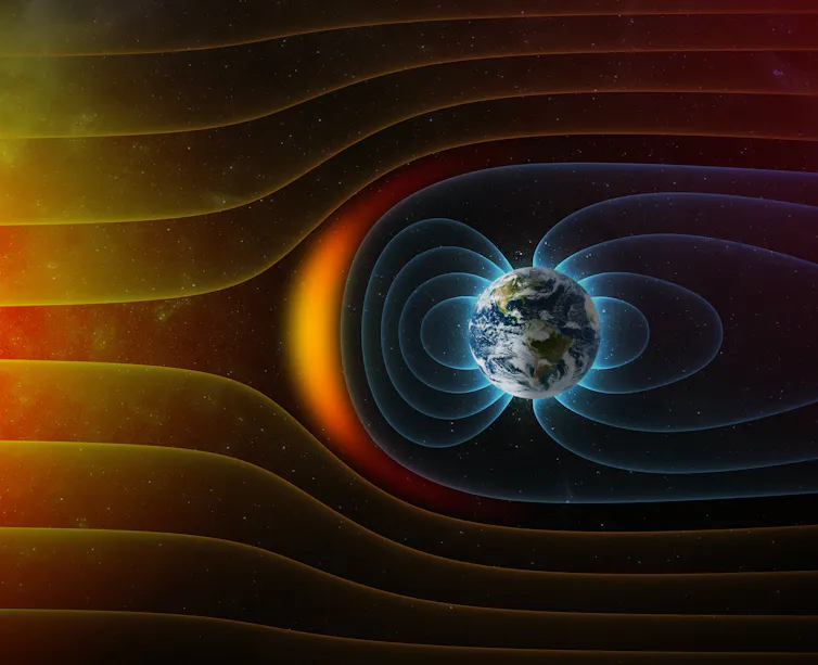 Diagrama mostrando a Terra cercada por uma bolha de linhas azuis que desviam um fluxo de linhas laranja