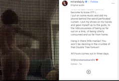A woman dancing naked behind a curtain.